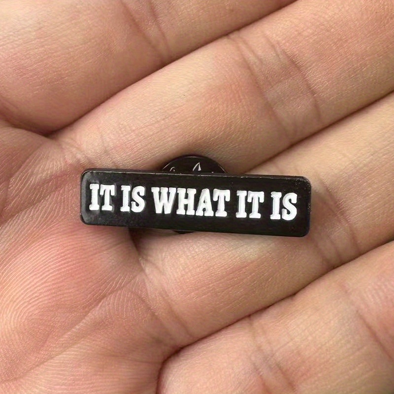 Broche con cita de letra 