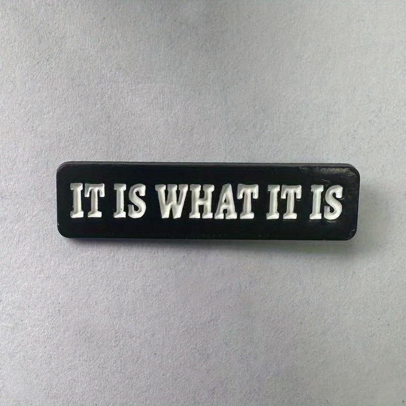 Broche con cita de letra 